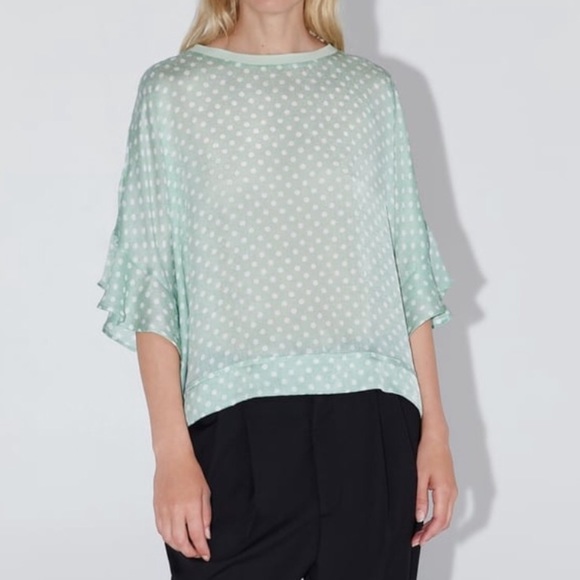 green and white polka dot top